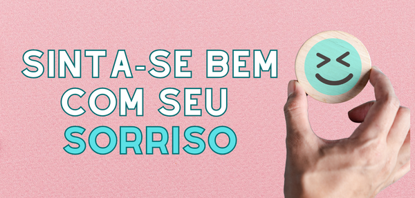 Fundo rosa, com uma mão segurando um círculo com carinha de feliz e os escritos: Sinta-se bem com seu sorriso